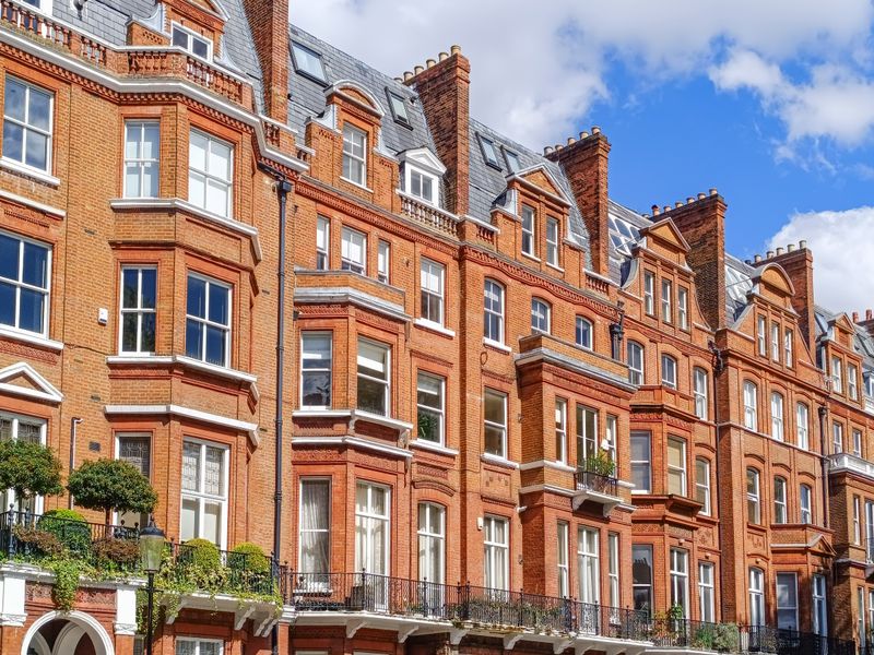 Red-brick mansion blocks, representing real estate advice at KMT Solicitors